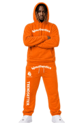 Bold orange matching sweatsuit with 'Wiauthentics' logo and 'TRENDSETTER' text, streetwear style