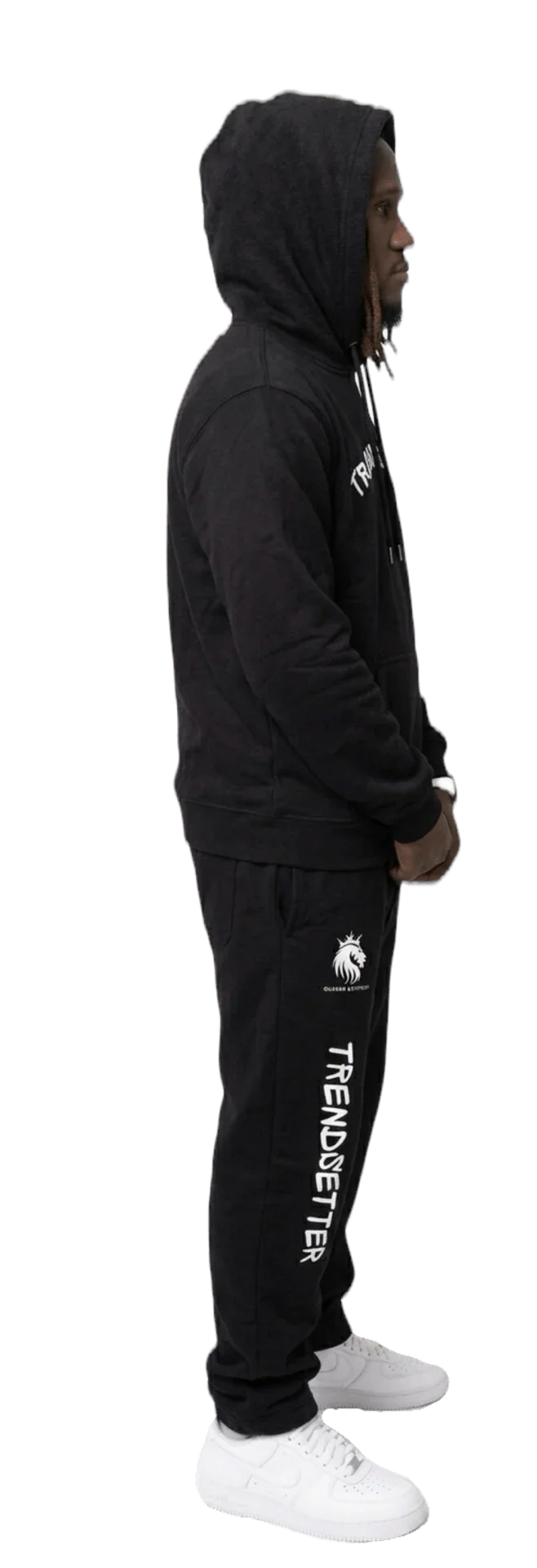 Black hooded sweatsuit with 'TRENDSETTER' print, matching joggers, white sneakers, streetwear style
