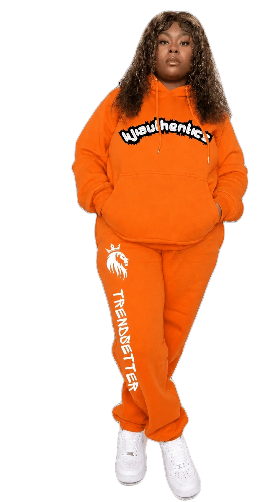 Bold orange matching sweatsuit with graphic hoodie and lion logo joggers, streetwear set